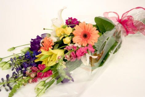 presentation bouquet of seasonal flowers hand selected for color and style